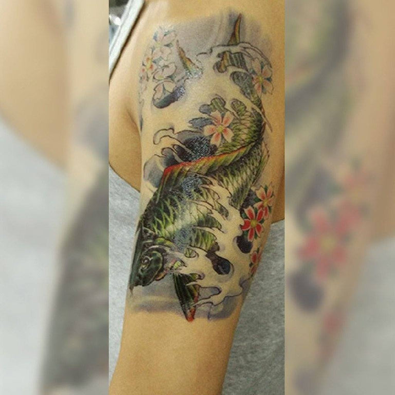 koi fish tattoo forearm blue