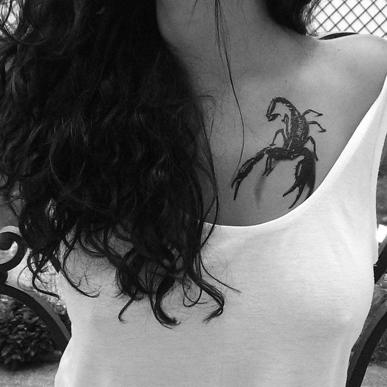 scorpion tattoo on back of neck